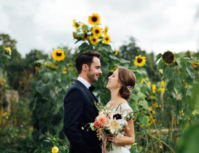 wedding couple with sunflowers